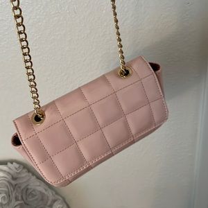 pink and gold small handbag